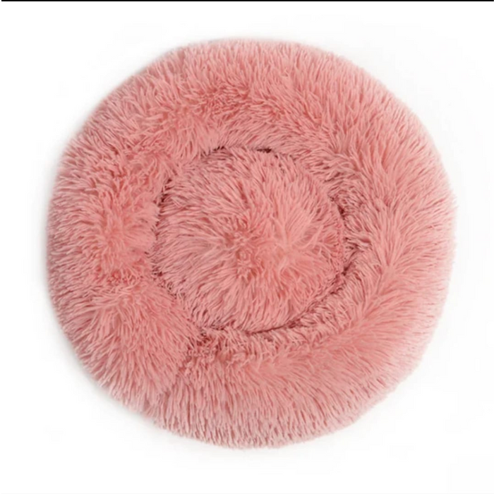 Cama redonda com pêlo Relax de 50 cm na cor rosa, ideal para proporcionar conforto e aconchego a cães e gatos. Design macio e acolhedor, perfeito para momentos de descanso e relaxamento.