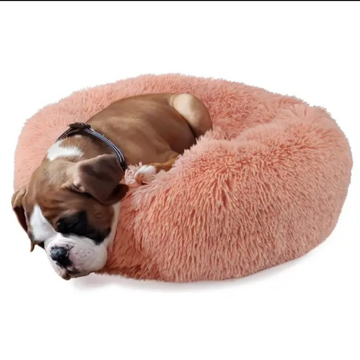 Cama redonda com pêlo Relax de 50 cm na cor rosa, ideal para proporcionar conforto e aconchego a cães e gatos. Design macio e acolhedor, perfeito para momentos de descanso e relaxamento.
